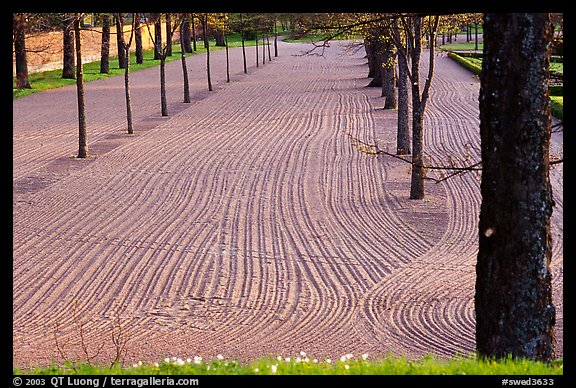 Raked sand in the garden of the 12th century church in Gamla Uppsala. Uppland, Sweden