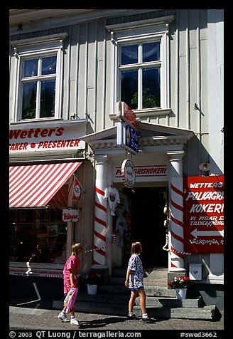 Kids in front of candy store in Granna. Gotaland, Sweden (color)