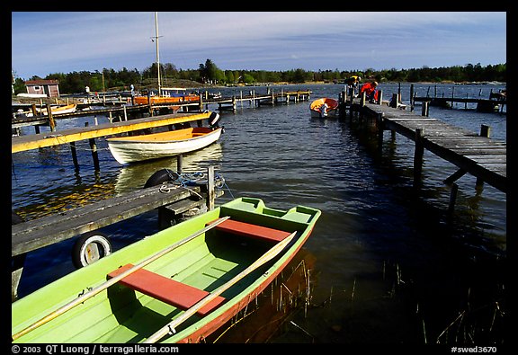 Boats and pier. Gotaland, Sweden (color)
