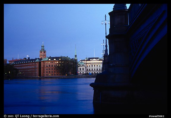 Bridge on Riddarfjarden and Gamla Stan, midnight twilight. Stockholm, Sweden