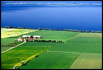 Fields bordering lake Vattern near Granna. Gotaland, Sweden (color)