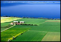 Fields bordering lake Vattern near Granna. Gotaland, Sweden