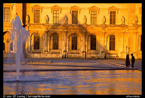 Basin and projected shadow of the Pei pyramid on the Louvre at sunset. Paris, France