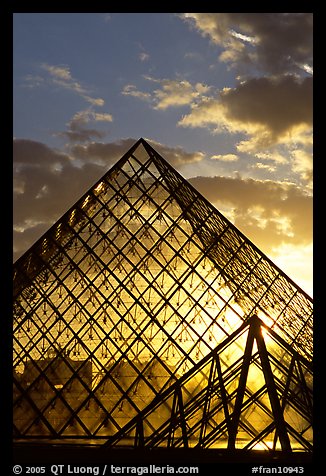 Louvre pyramid transparent at sunset. Paris, France (color)