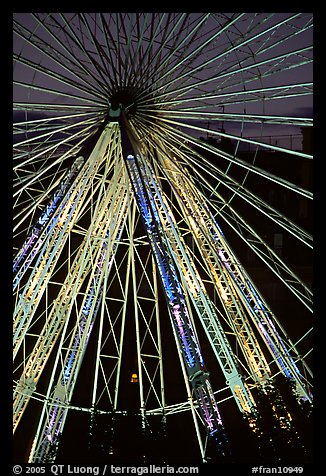 Lighted Ferris wheel in the Tuileries garden. Paris, France (color)