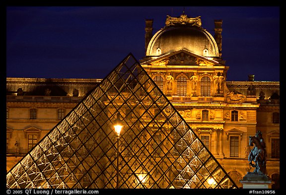 Pyramid and Louvre at night. Paris, France