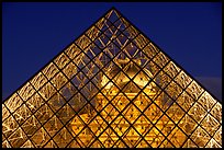 Louvre seen through pyramid at night. Paris, France (color)