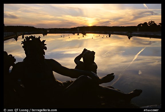 Sculpture and basin at sunset, Versailles Palace. France