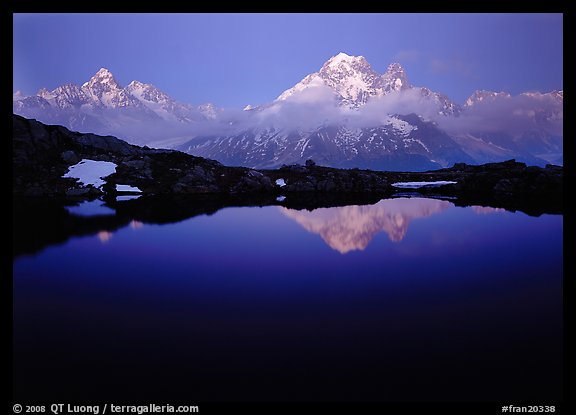 Aiguille Verte reflected in pond at dusk, Chamonix. France (color)