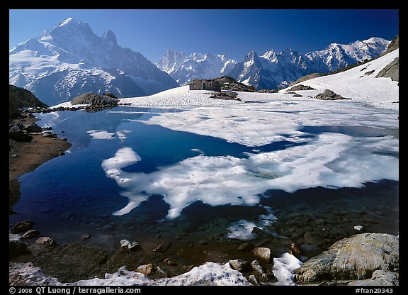 Partly Frozen Lac Blanc, Aiguille Verte, and Mont-Blanc range, Chamonix. France (color)