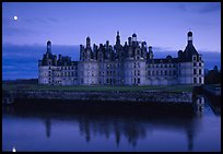 Chambord chateau at dusk with moonrise. Loire Valley, France (color)
