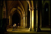 Worshiper inside the Saint-Etienne Cathedral. Bourges, Berry, France ( color)