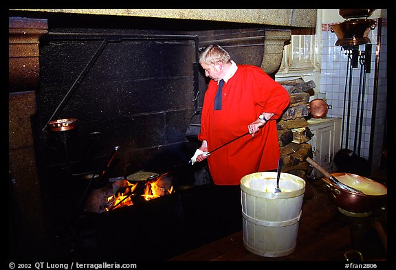 Baking the famous Omelette de la mere Poularde at the eponymous restaurant. Mont Saint-Michel, Brittany, France