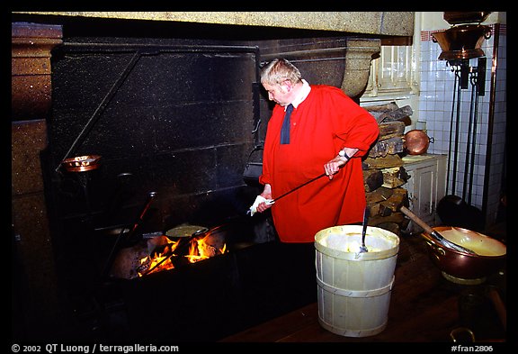 Baking the famous Omelette de la mere Poularde at the eponymous restaurant. Mont Saint-Michel, Brittany, France (color)