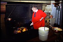 Baking the famous Omelette de la mere Poularde at the eponymous restaurant. Mont Saint-Michel, Brittany, France