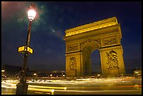 Arc de Triomphe illuminated at night. Paris, France