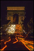 Arc de Triomphe and lights of cars on Champs Elysees. Paris, France