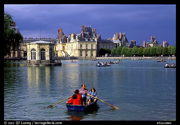 Rowers and Fontainebleau palace. France (color)