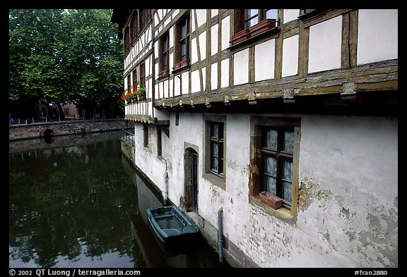 Half-timbered houses next to a canal. Strasbourg, Alsace, France (color)