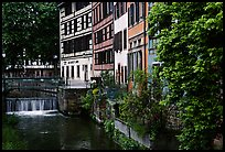 Half-timbered houses next to a canal. Strasbourg, Alsace, France