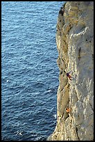 Rock climbing above water in the Calanque de Morgiou. Marseille, France