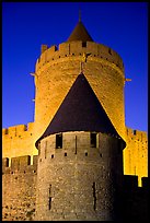 Towers with witch hat roofs by night. Carcassonne, France (color)