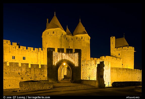 Medieval city and main entrance by night. Carcassonne, France