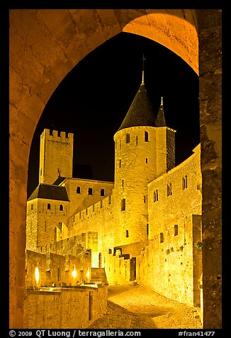 Medieval castle illuminated at night. Carcassonne, France