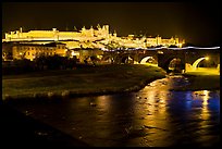 Fortified city and Pont Vieux crossing the Aude River by night. Carcassonne, France ( color)