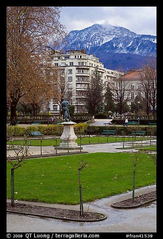 Public garden and snowy mountains. Grenoble, France