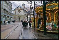 Street carousel and church. Grenoble, France