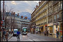 Bicyclist and tramway next to Victor Hugo place. Grenoble, France ( color)