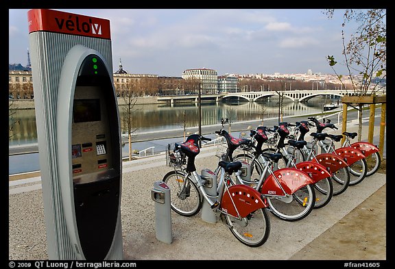 Bicycles for rent with automated kiosk checkout. Lyon, France