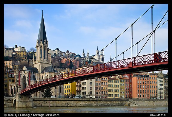 Suspension brige on the Saone River and St-George church. Lyon, France