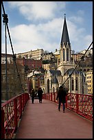 Walking across the passerelle Saint-Georges. Lyon, France (color)