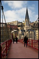 Walking across the passerelle Saint-Georges. Lyon, France