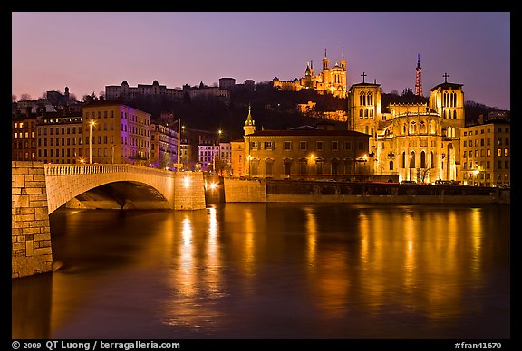 Napoleon Bridge, Saone River and Fourviere Hill at night. Lyon, France