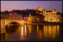 Napoleon Bridge, Saone River and Fourviere Hill at night. Lyon, France (color)