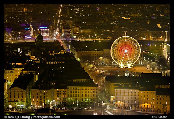 Bellecour square with Ferris wheel at night, seen from above. Lyon, France