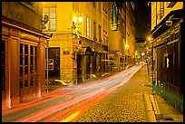 Street with light trails left by cars. Lyon, France (color)