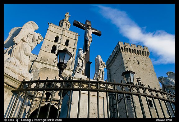 Crucifix in front of Notre-Dame-des-Doms Cathedral. Avignon, Provence, France