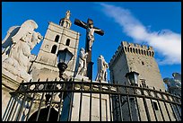 Crucifix in front of Notre-Dame-des-Doms Cathedral. Avignon, Provence, France (color)