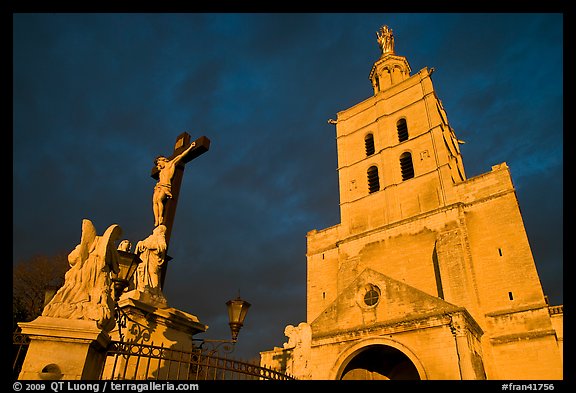Crucifix and romanesque tower of Notre-Dame-des-Doms Cathedral. Avignon, Provence, France (color)