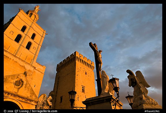 Towers and statues at sunset. Avignon, Provence, France