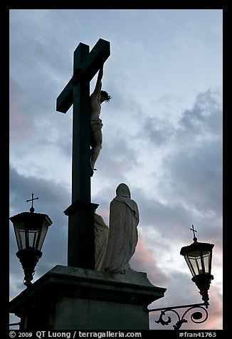 Cross with Christ at sunset. Avignon, Provence, France (color)