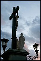 Cross with Christ at sunset. Avignon, Provence, France (color)