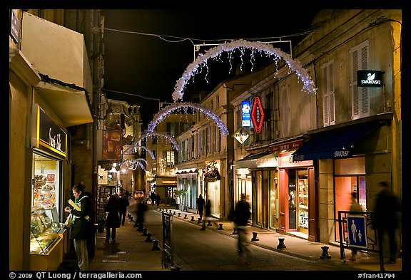 Commercial street at night. Avignon, Provence, France (color)
