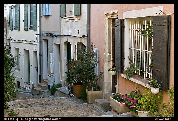 Facades of painted houses. Arles, Provence, France