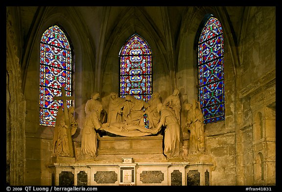 Christ sculpture and stained glass windows, St Trophime church. Arles, Provence, France