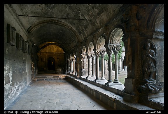 Romanesque gallery with delicately sculptured columns, St Trophimus cloister. Arles, Provence, France (color)